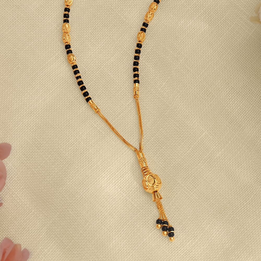 

Dazzling Yellow Gold Carved Bead Mangalsutra